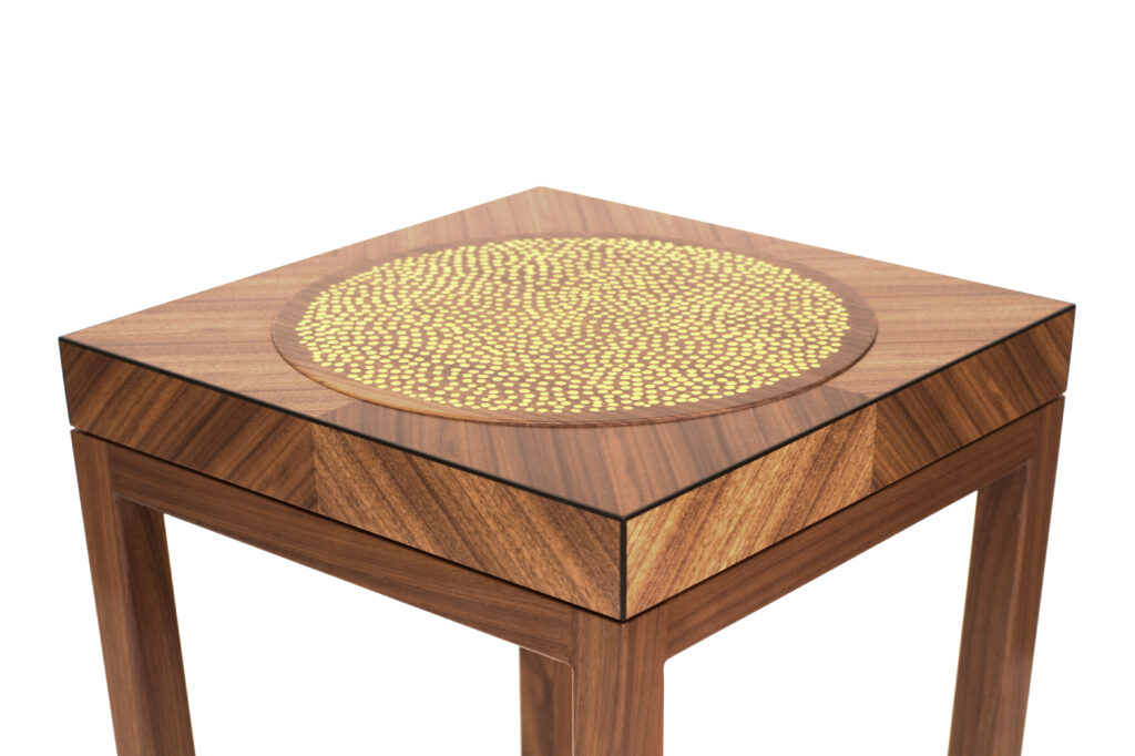 The Golden Table By Edward Wild showing the gilded top of the table in a close up view