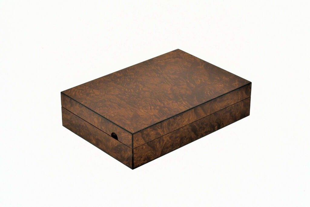 A smoked chestnut cufflink box by Edward Wild